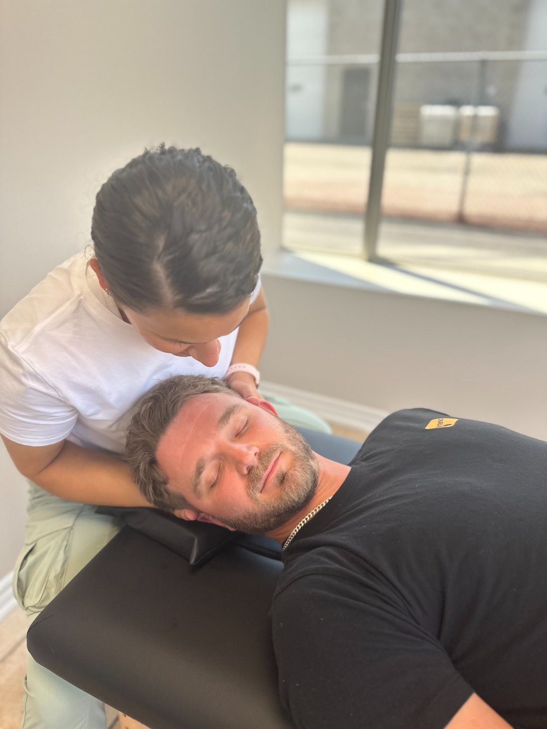 Alessia Marchese performing a hands-on osteopathic treatment